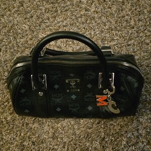 Authentic MCM Black Purse with Silver Accents & Charm